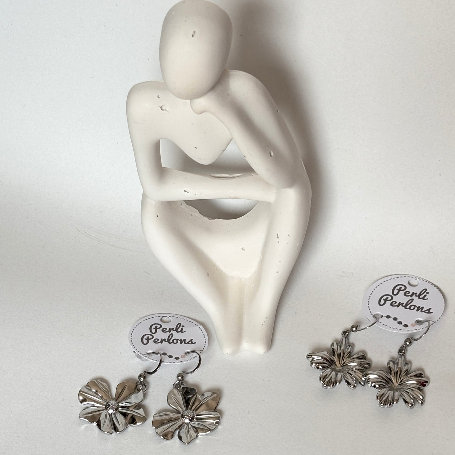 Boucles fleur ou feuille