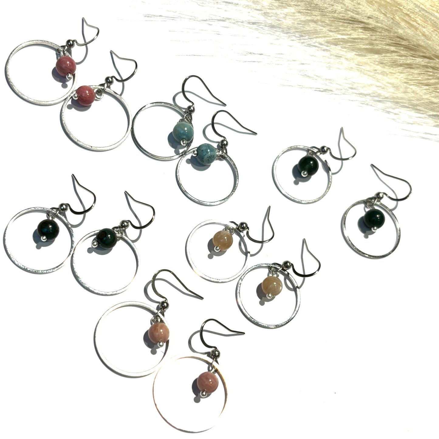 Boucles pierres encerclées